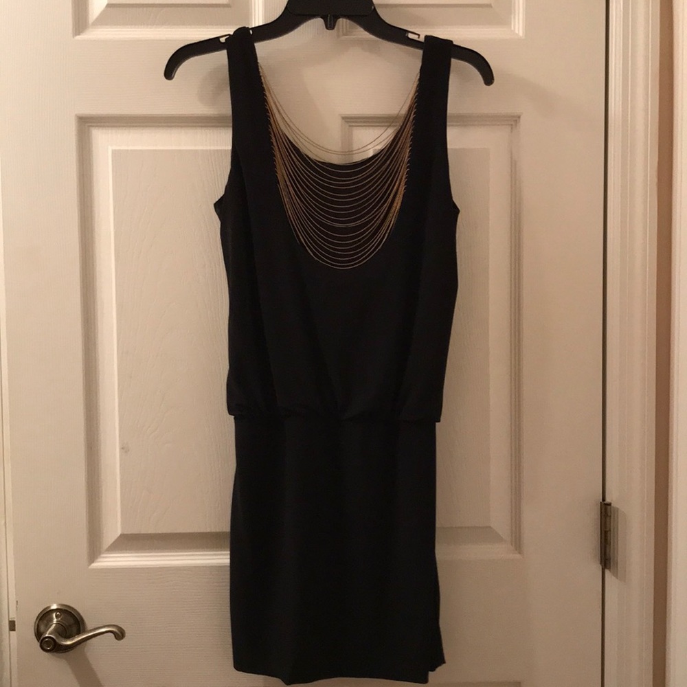 black dress with gold accents